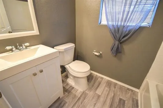 a bathroom with a sink and a toilet
