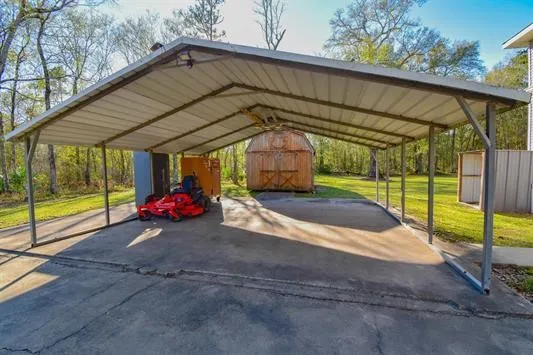 a view of a house with backyard and porch