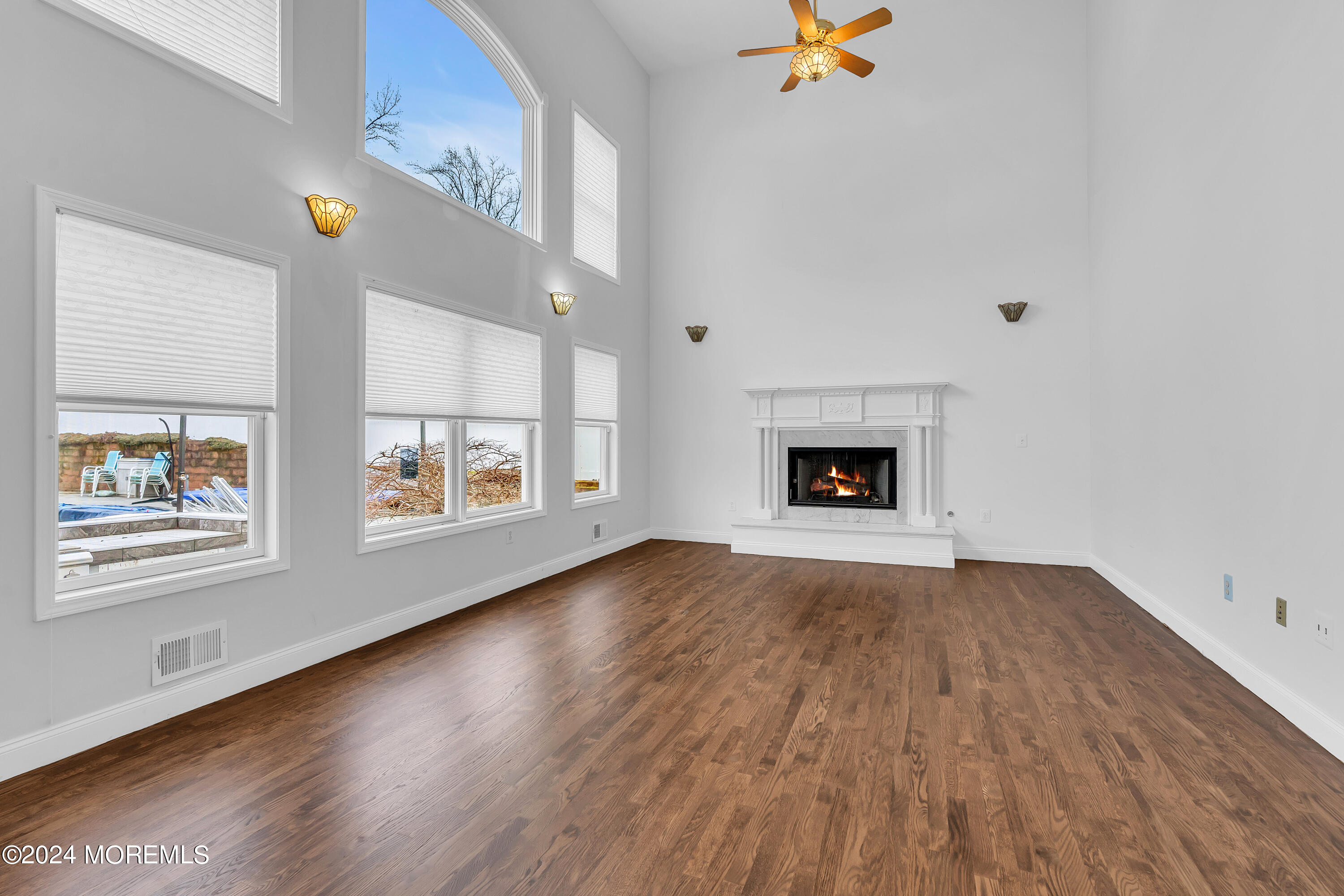 107 Autumn Road Matawan, NJ 07747 - Photo 9 of 45 FAMILY ROOM FIREPLACE ENHANCED