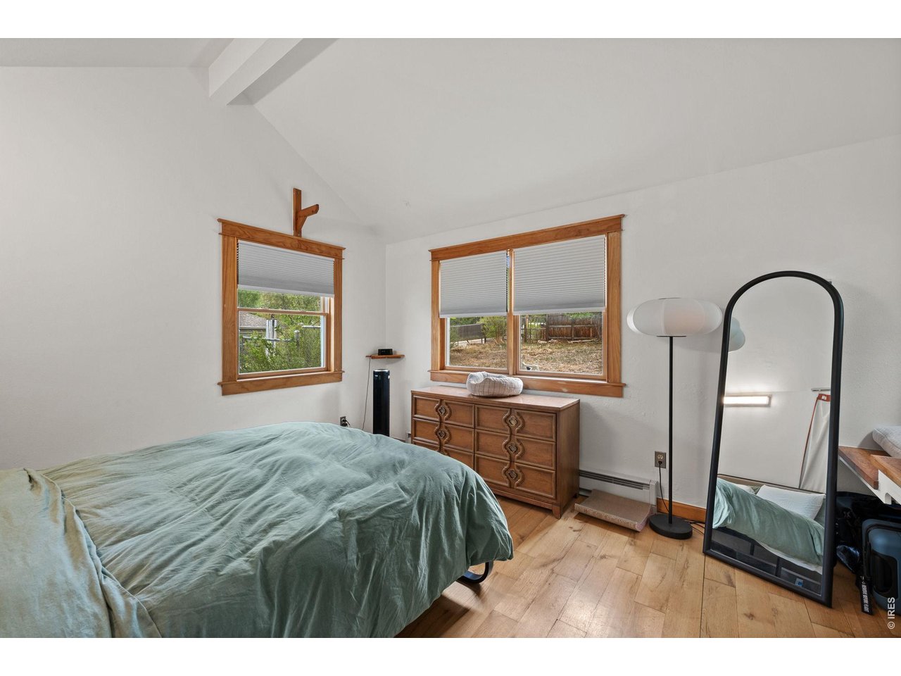 3005 6th Street Boulder, CO 80304 - Photo 24 of 41 a bedroom with a bed and a large window