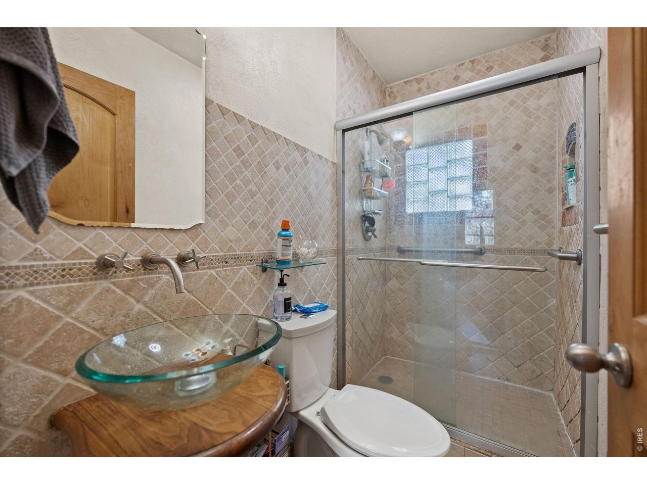 3005 6th Street Boulder, CO 80304 - Photo 26 of 41 a bathroom with a sink and a mirror
