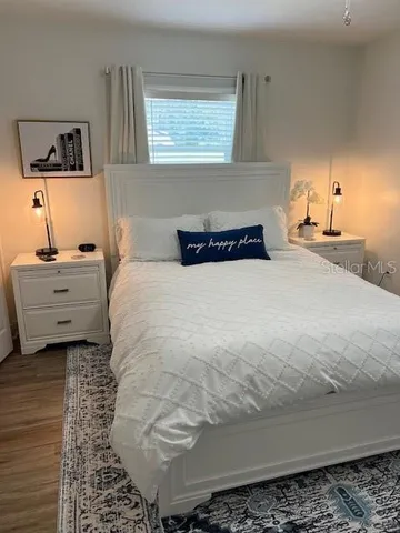 a view of room with flat screen tv