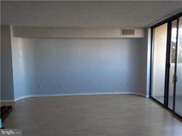 1101 South Arlington Ridge Road, Unit 213 Arlington, VA 22202 - Photo 3 of 6 a view of an empty room