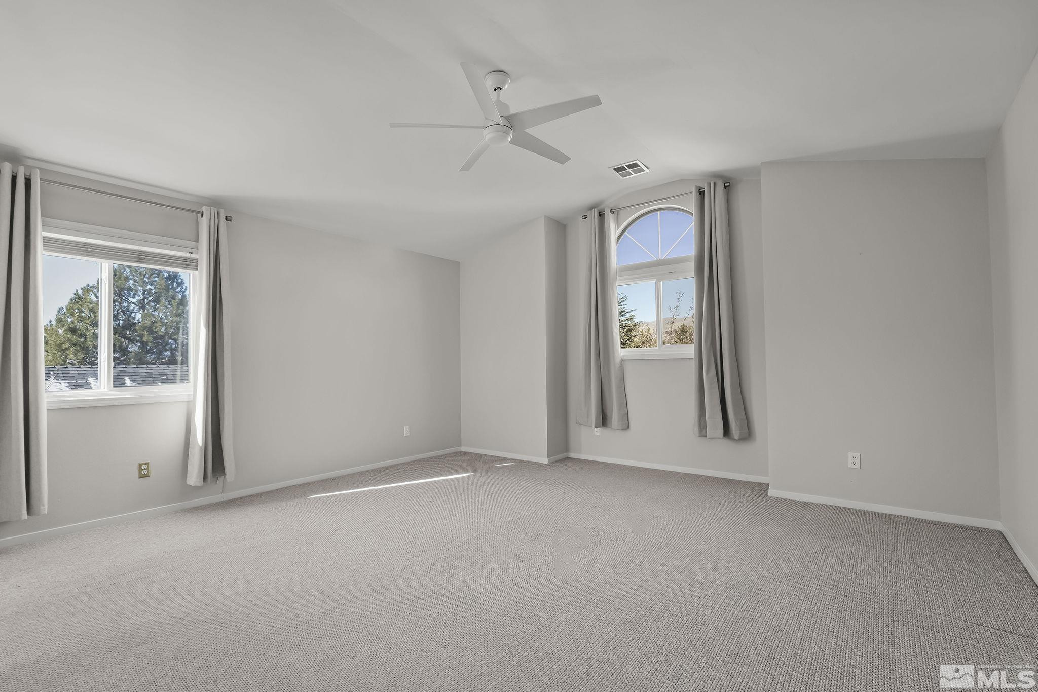 5380 Simons Drive Reno, NV 89523 - Photo 21 of 39 an empty room with windows and closet