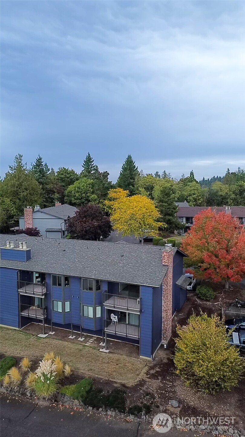 3560 Narrows View Lane Northeast, Unit 5201 Bremerton, WA 98310 - Photo 26 of 28 a view of a house with a yard from a kitchen