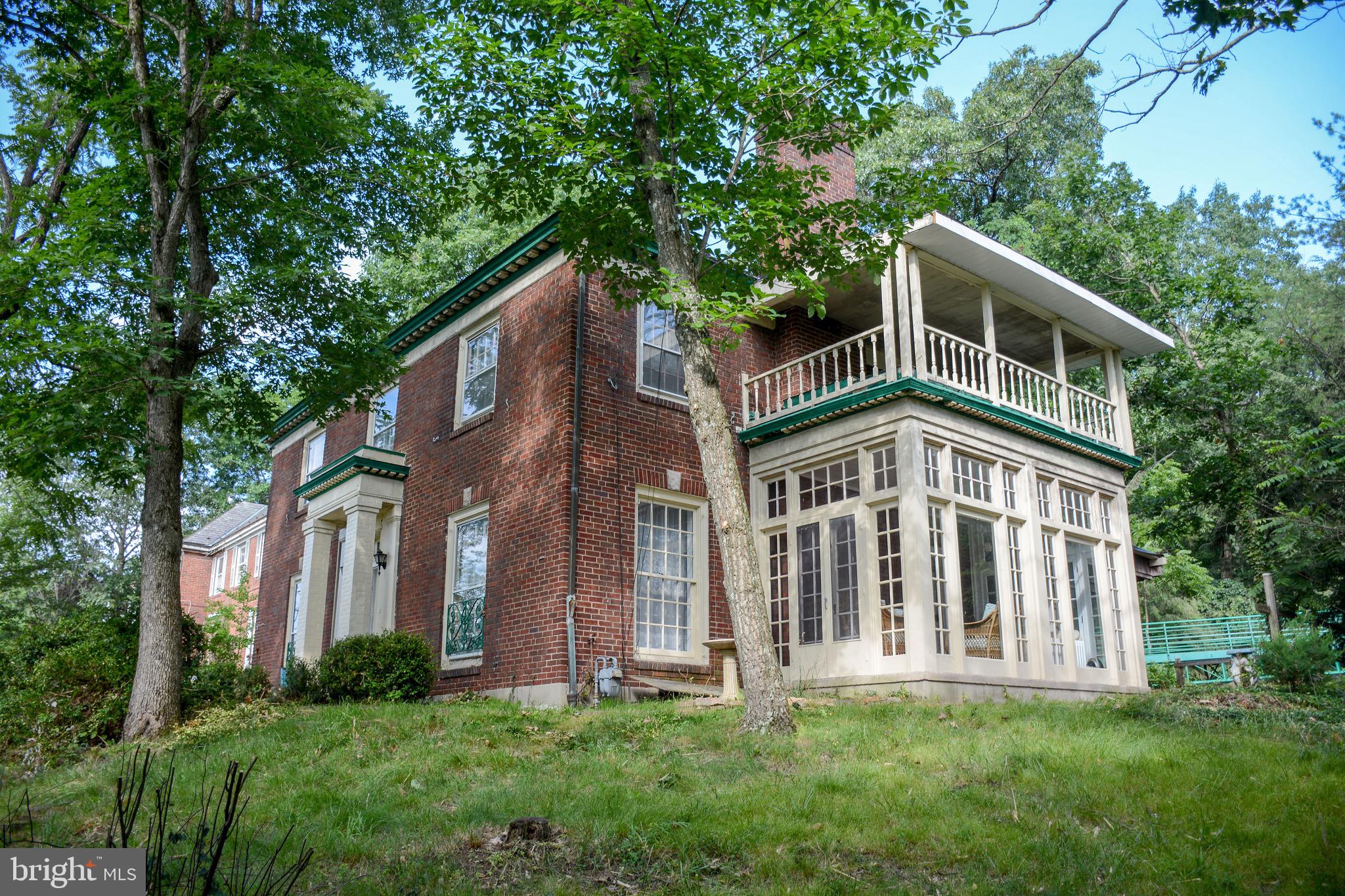 831 Windsor Road Cumberland, MD 21502 - Photo 3 of 78 Side sunroom with balcony above it...