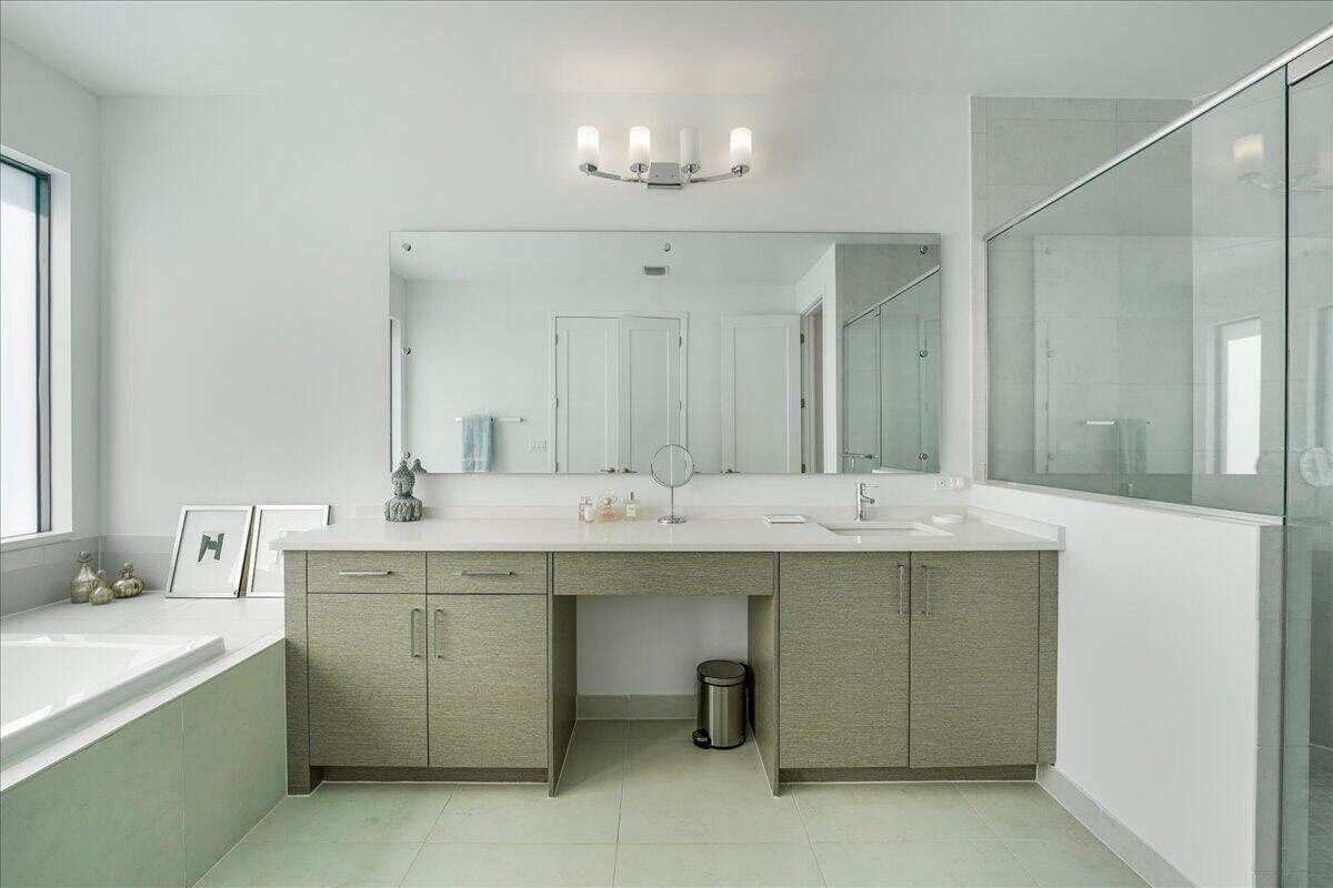 17496 Sparkling River Road Boca Raton, FL 33496 - Photo 20 of 36 a bathroom with a sink double vanity and a mirror