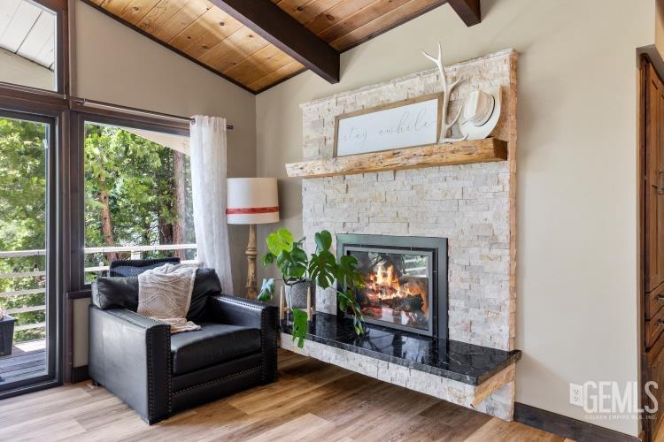 Undisclosed Address Wofford Heights, CA 93285 - Photo 17 of 35 a living room with furniture and a fireplace