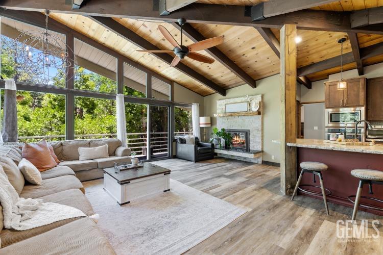 Undisclosed Address Wofford Heights, CA 93285 - Photo 18 of 35 a living room with furniture and a large window