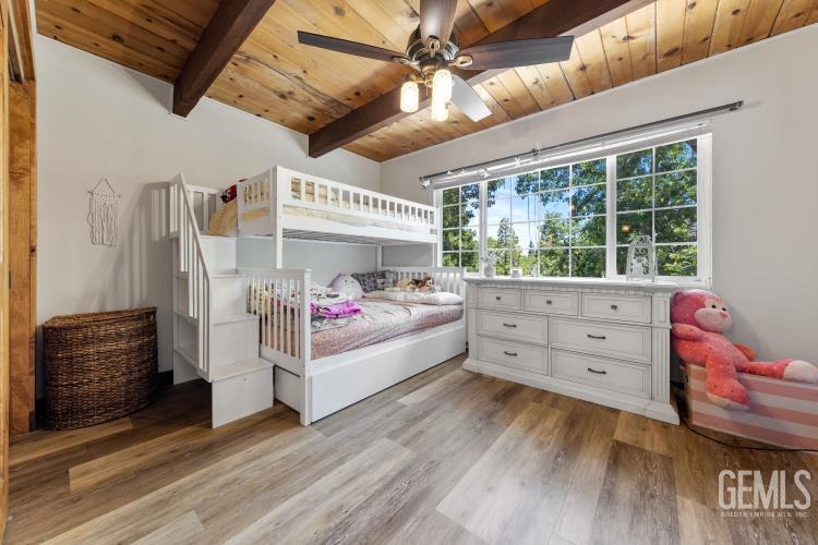 Undisclosed Address Wofford Heights, CA 93285 - Photo 28 of 35 a room with furniture and a wooden floor