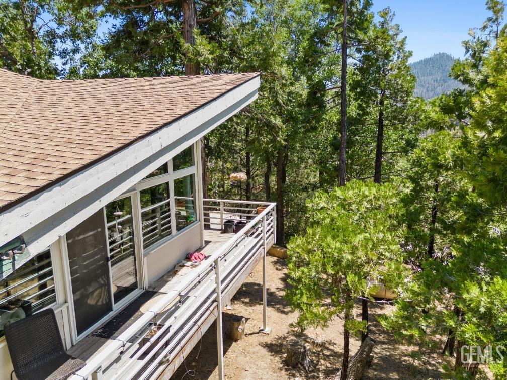 Undisclosed Address Wofford Heights, CA 93285 - Photo 3 of 35 a view of balcony with wooden floor and fence