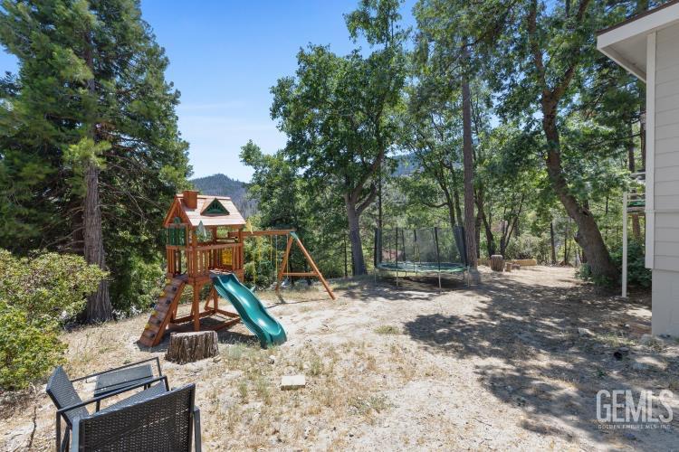 Undisclosed Address Wofford Heights, CA 93285 - Photo 35 of 35 a view of a house with a park