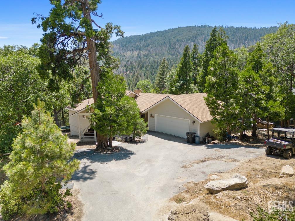 Undisclosed Address Wofford Heights, CA 93285 - Photo 4 of 35 a view of a backyard of a house