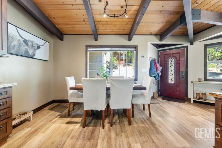 Undisclosed Address Wofford Heights, CA 93285 - Photo 10 of 35 a view of a dining room with furniture window and wooden floor
