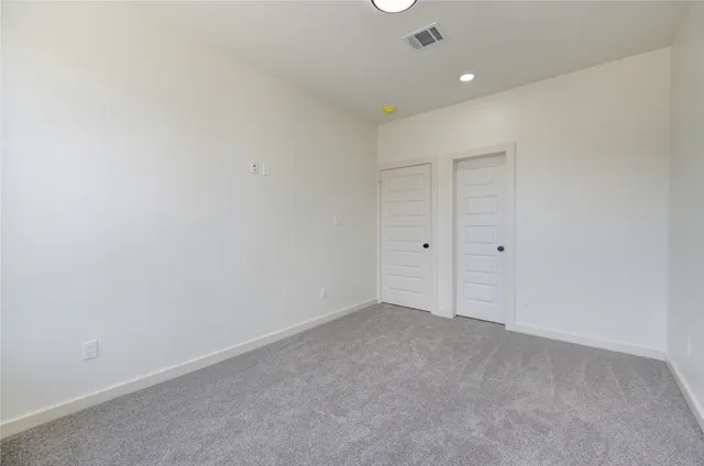 an empty room with an entryway