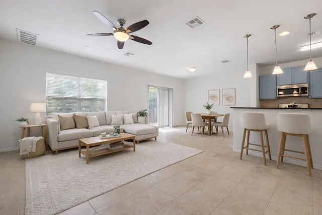 a view of a swimming pool with a patio