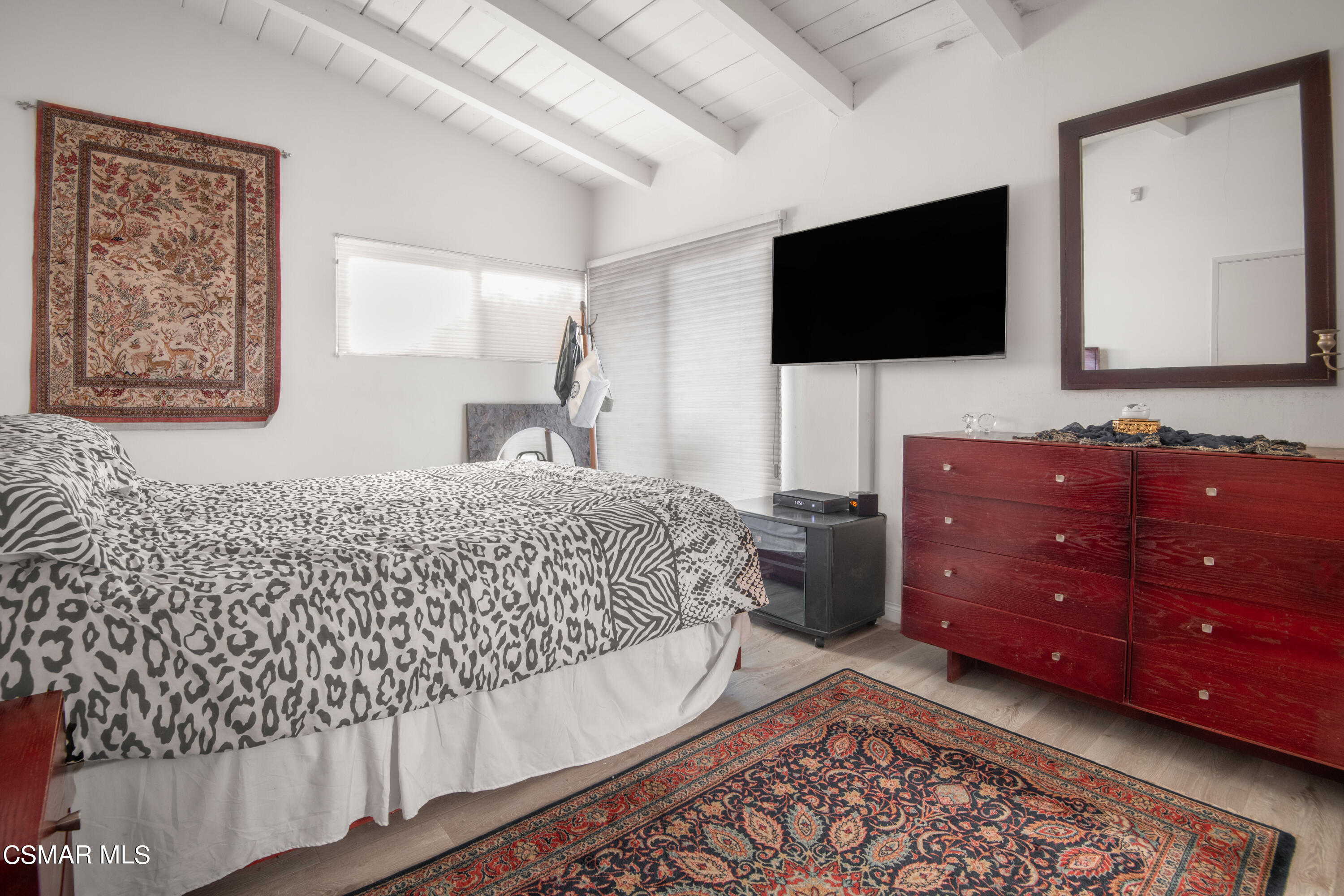 2420 Frey Avenue Venice, CA 90291 - Photo 15 of 24 a bedroom with a bed and a flat screen tv