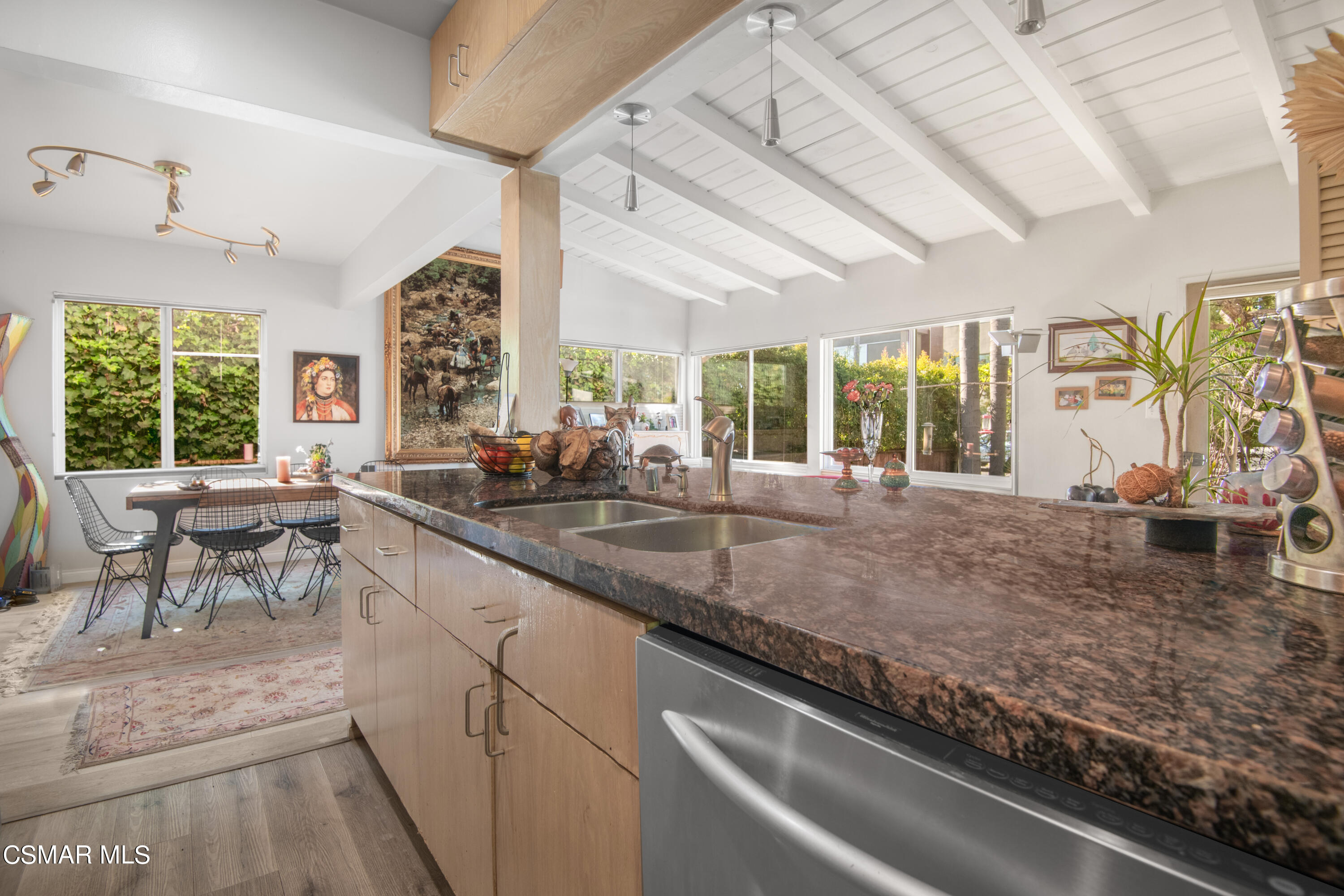 2420 Frey Avenue Venice, CA 90291 - Photo 10 of 24 a kitchen with stainless steel appliances granite countertop sink stove and cabinets