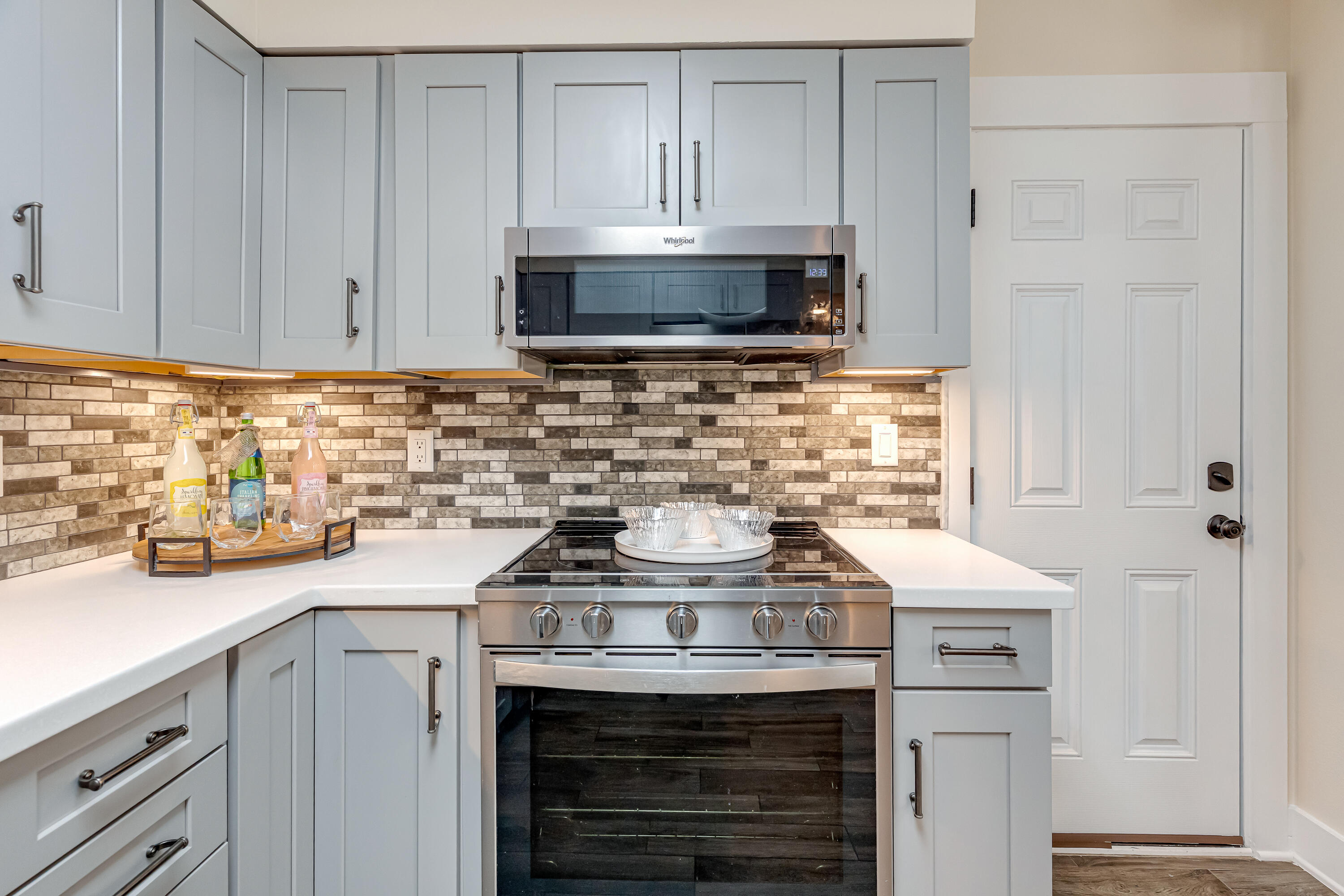 274 Kidd Street Fort Walton Beach, FL 32548 - Photo 17 of 74 a kitchen with a stove and a sink