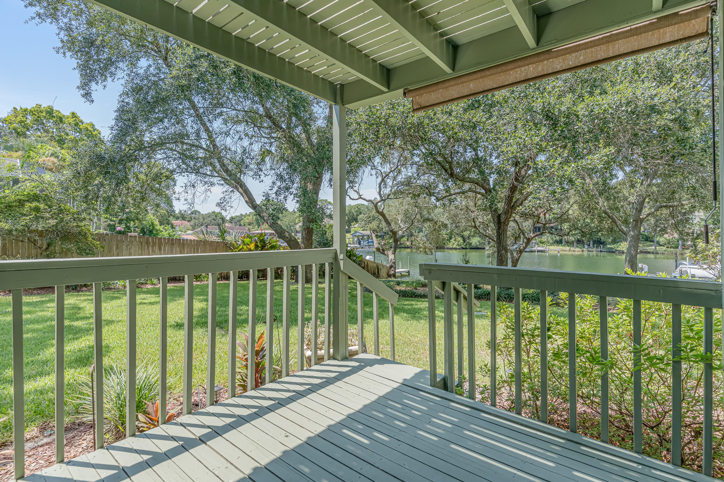 274 Kidd Street Fort Walton Beach, FL 32548 - Photo 23 of 74 a balcony with wooden floor and outdoor space