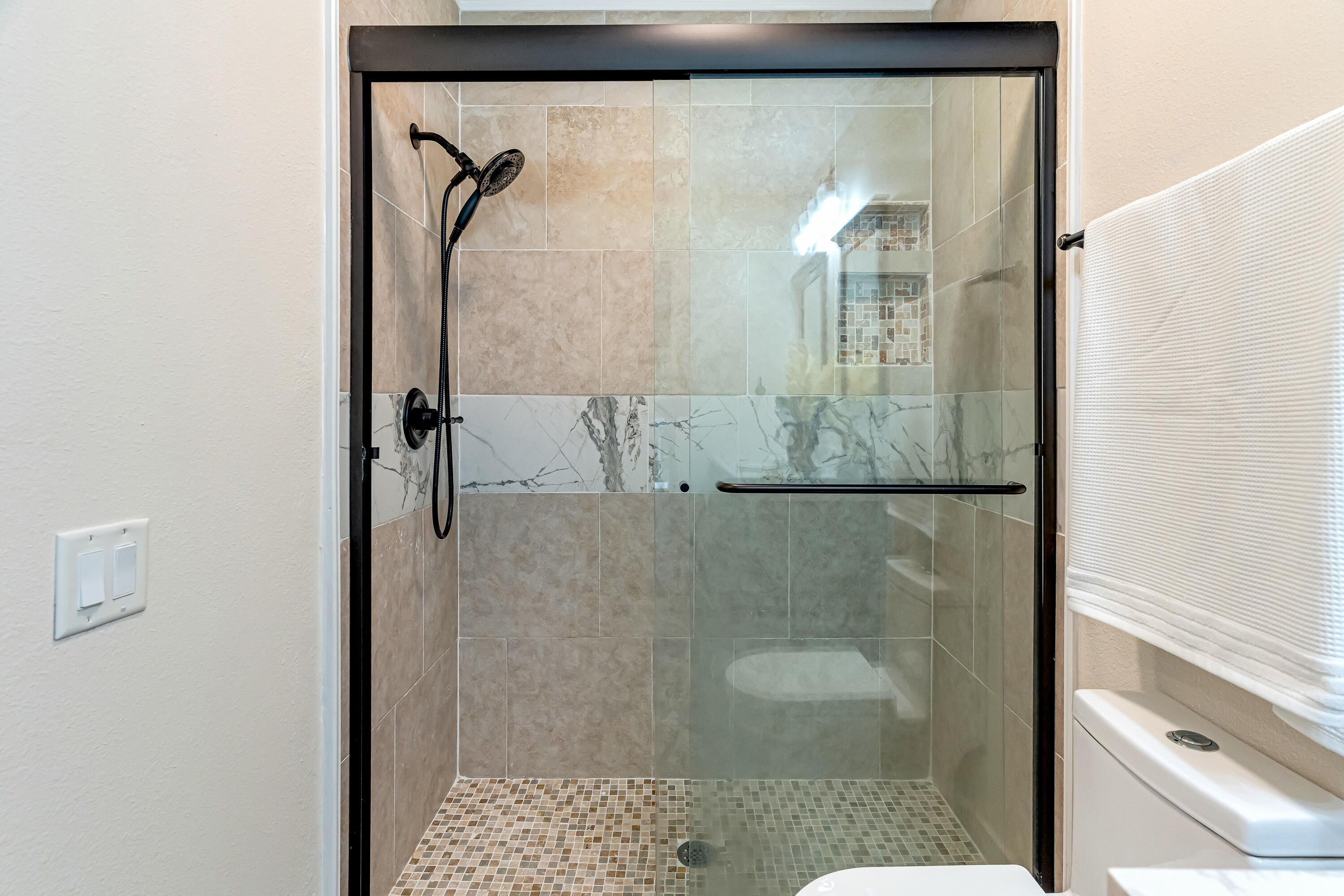 274 Kidd Street Fort Walton Beach, FL 32548 - Photo 36 of 74 a bathroom with a glass shower door