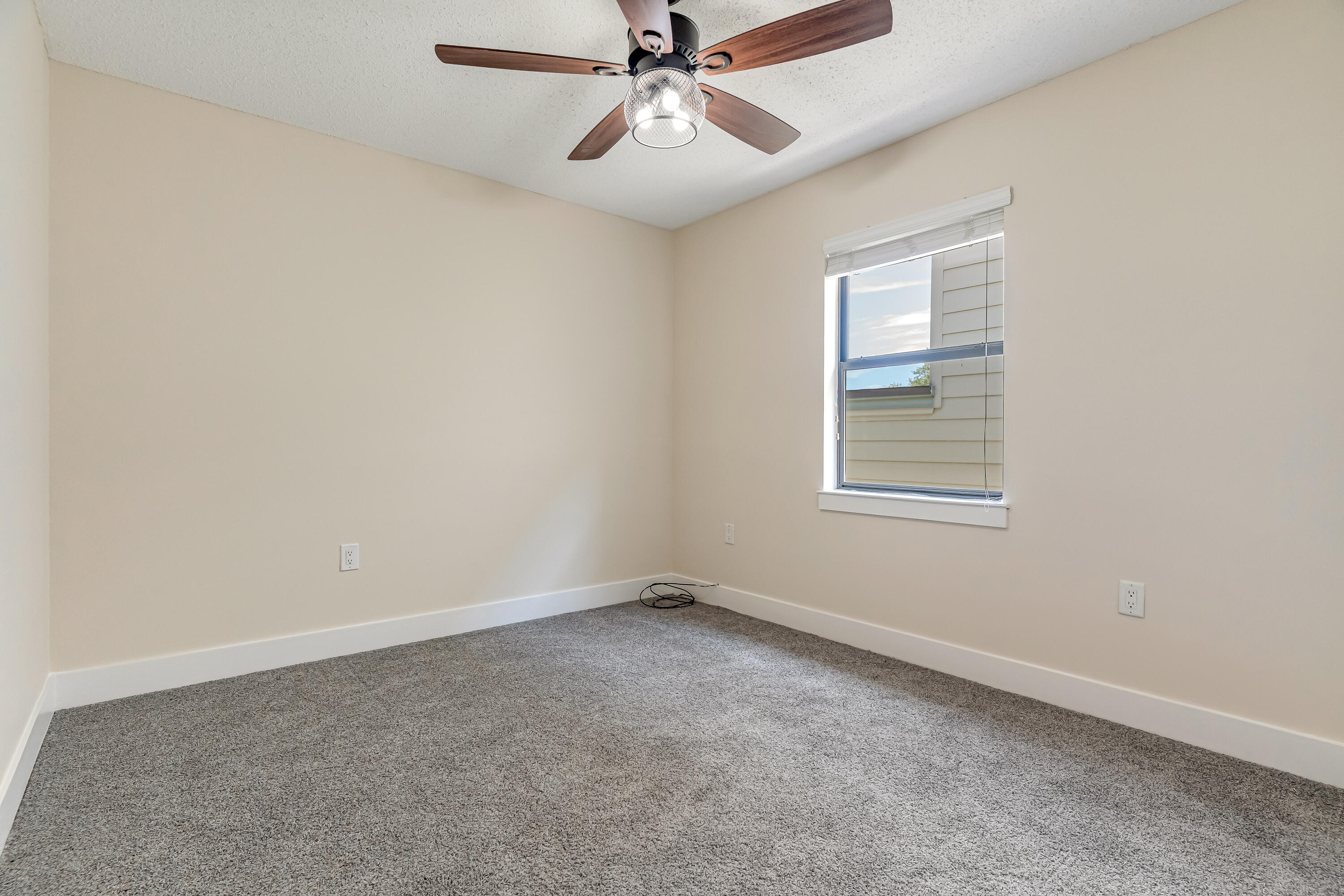 274 Kidd Street Fort Walton Beach, FL 32548 - Photo 41 of 74 an empty room with windows and fan