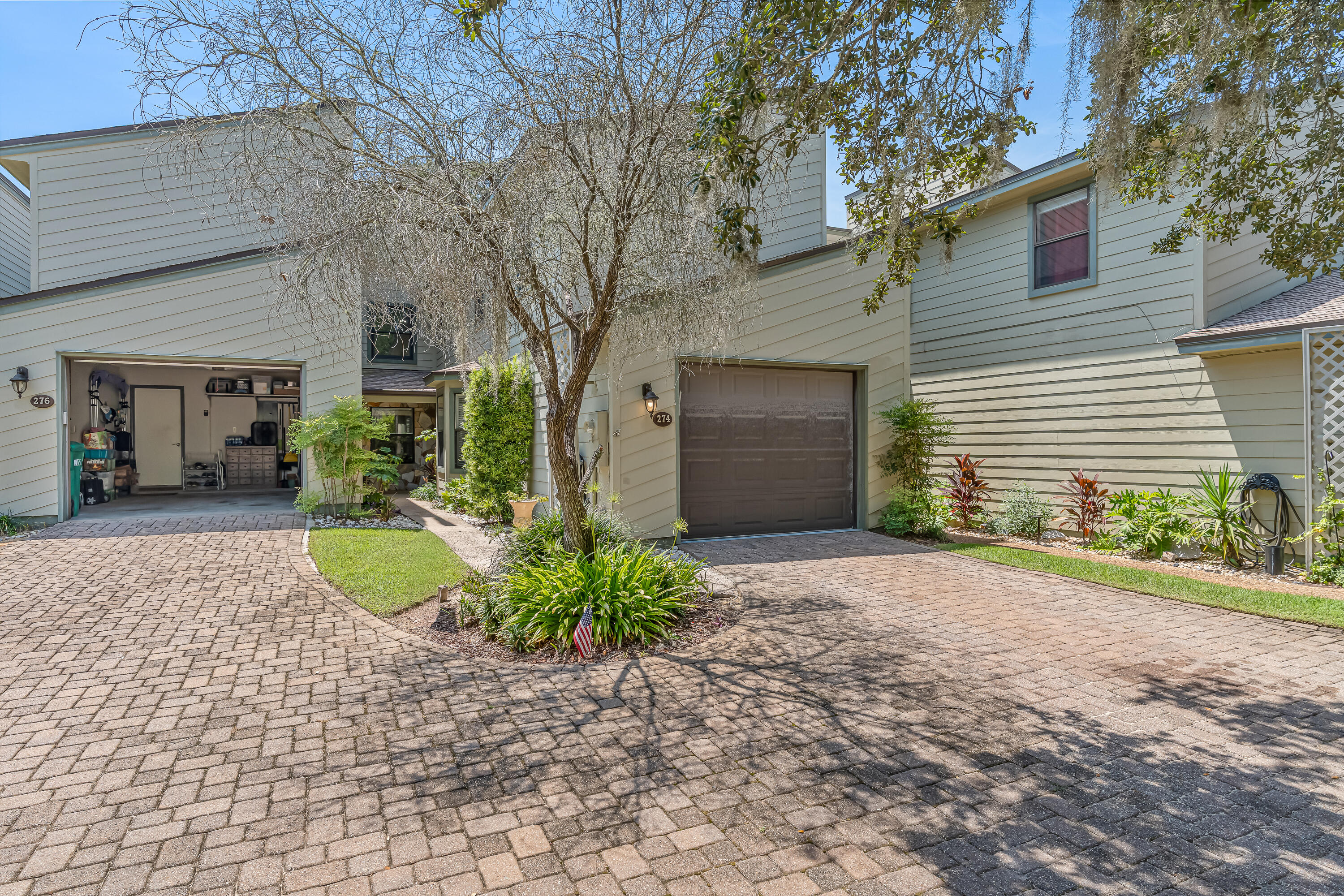 274 Kidd Street Fort Walton Beach, FL 32548 - Photo 66 of 74 a view of a house with a yard and potted plants