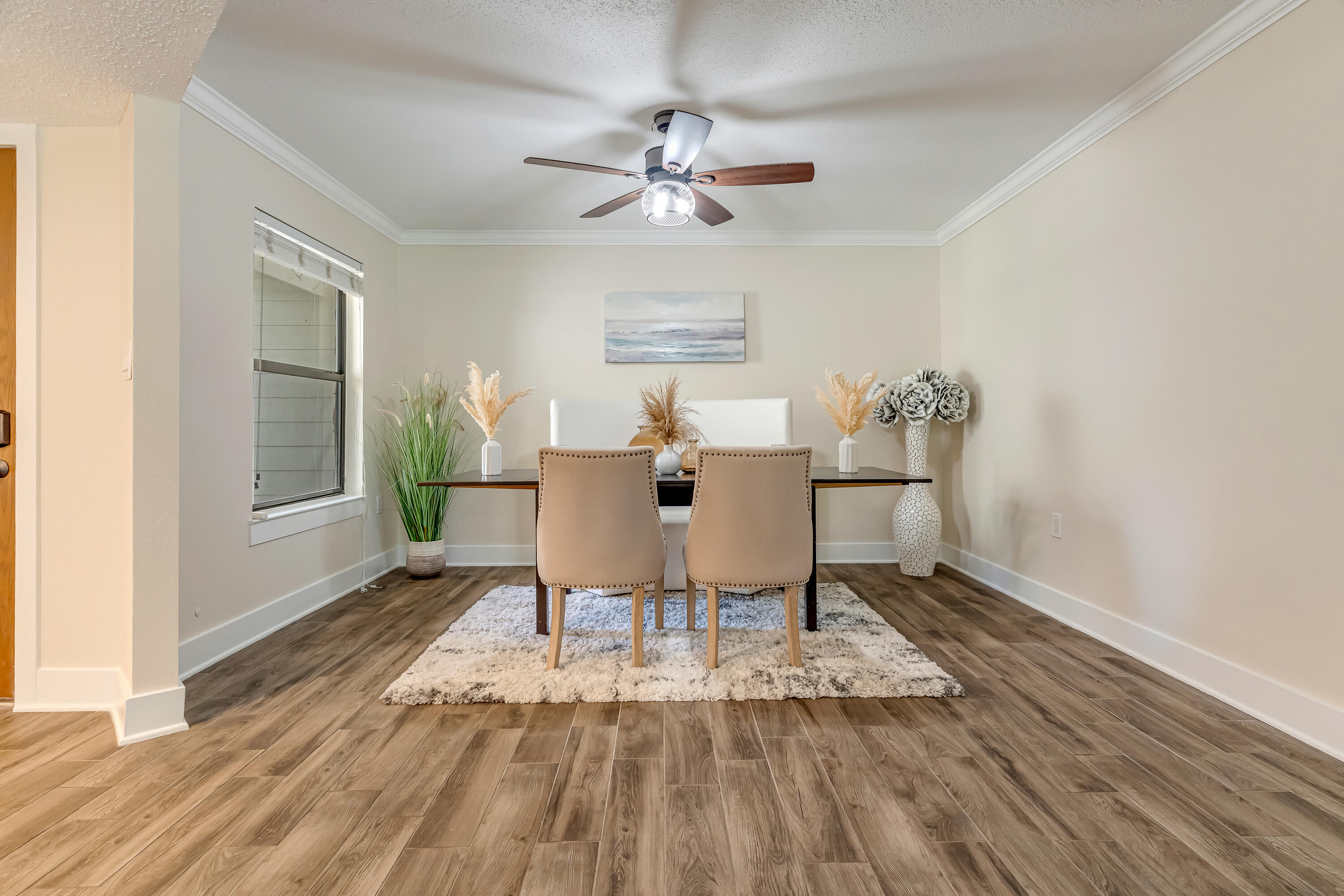 274 Kidd Street Fort Walton Beach, FL 32548 - Photo 9 of 74 a view of a dining room with furniture and wooden floor