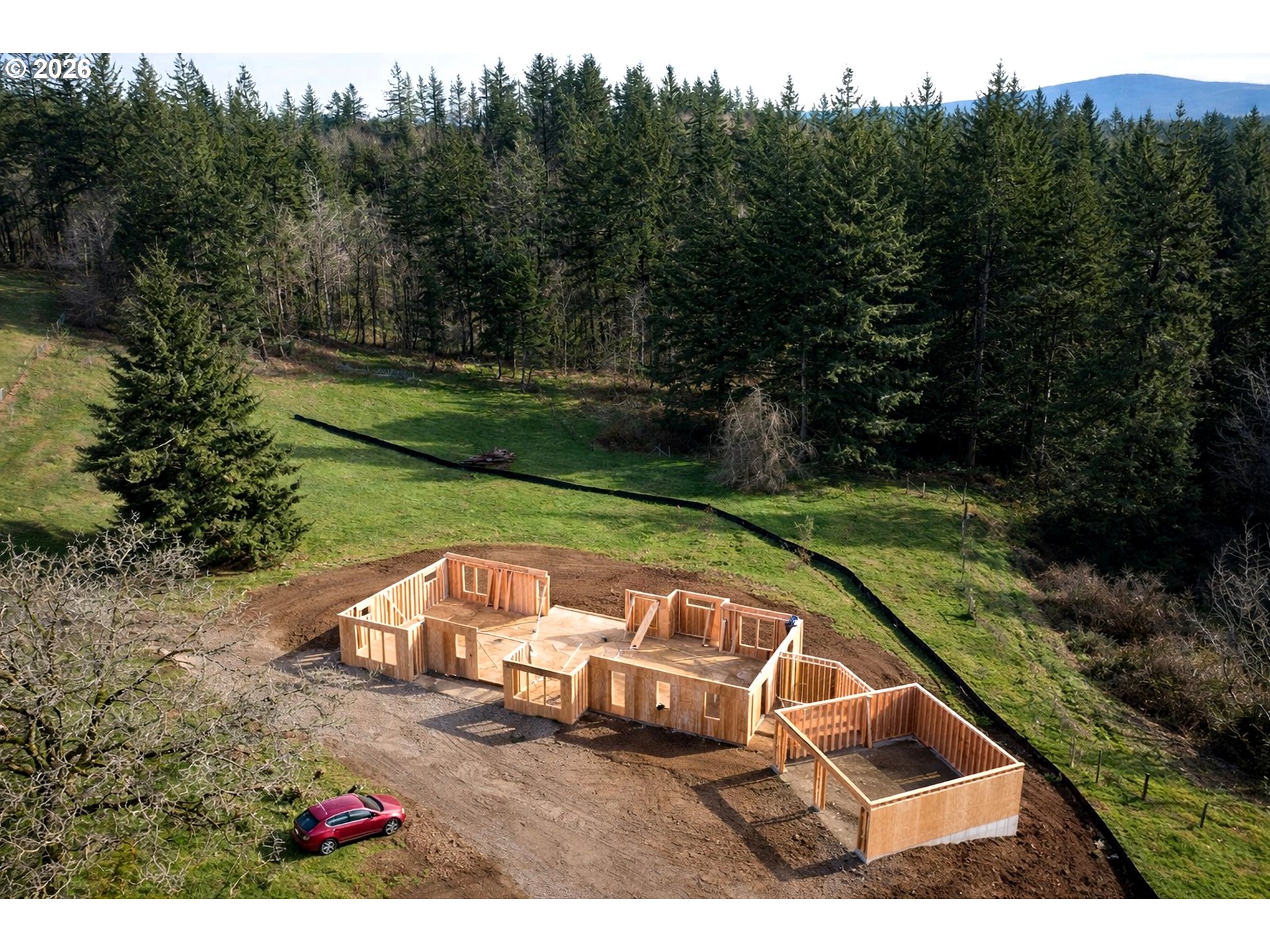 39143 Southeast Gibson Road Washougal, WA 98671 - Photo 1 of 26 a view of a wooden chairs and fire pit in the park