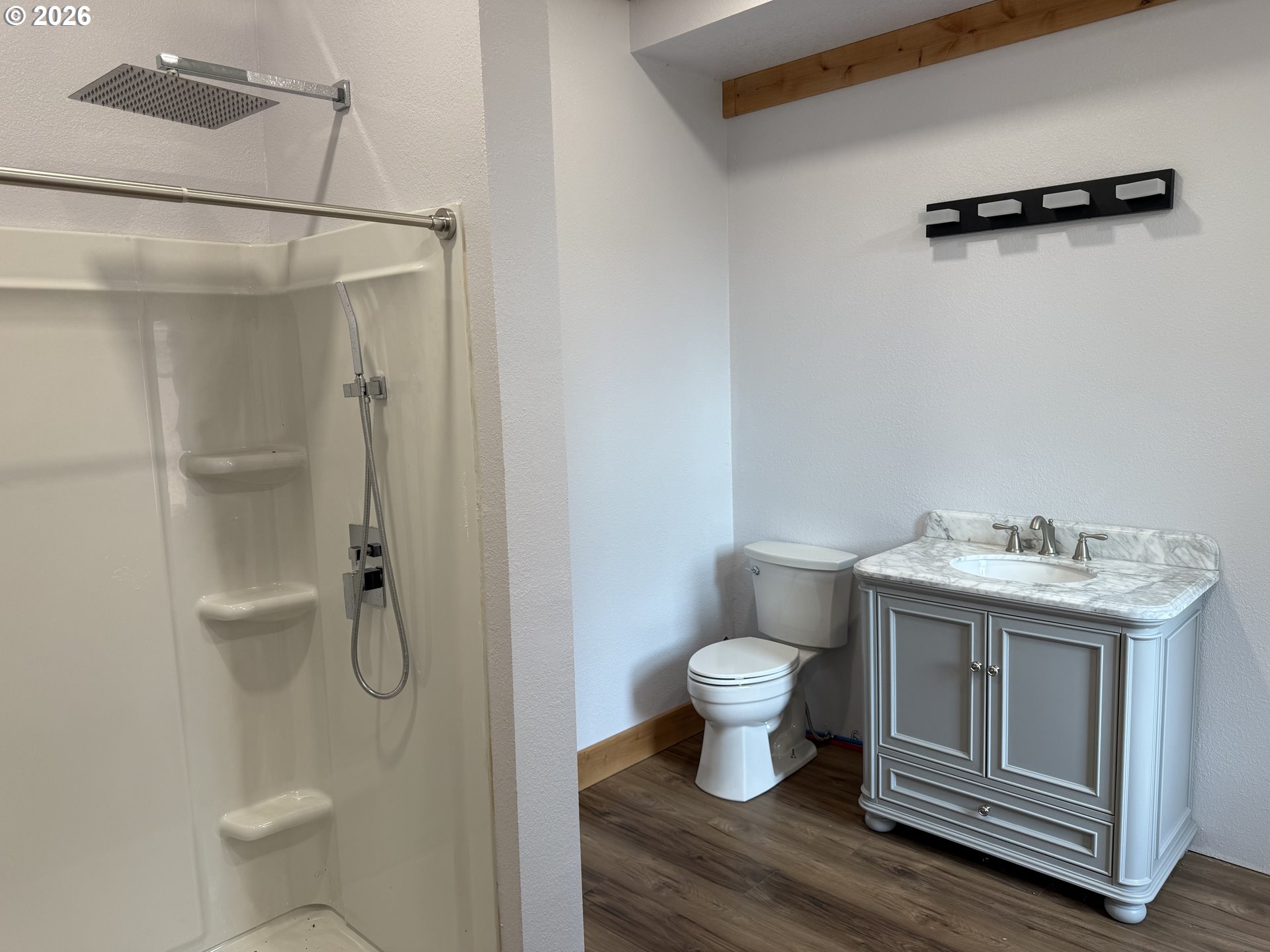 39143 Southeast Gibson Road Washougal, WA 98671 - Photo 12 of 26 a bathroom with a granite countertop sink toilet and shower
