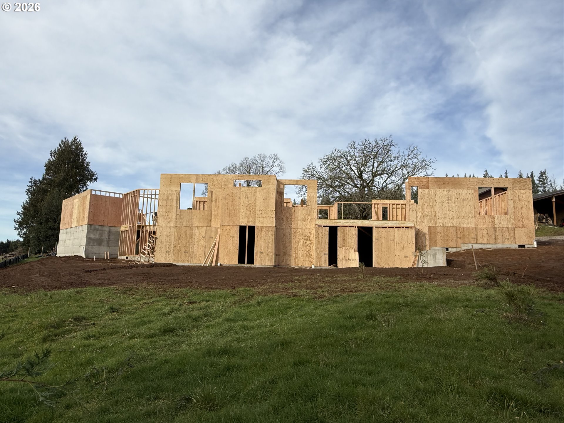 39143 Southeast Gibson Road Washougal, WA 98671 - Photo 17 of 26 a big house with a big yard and more large trees