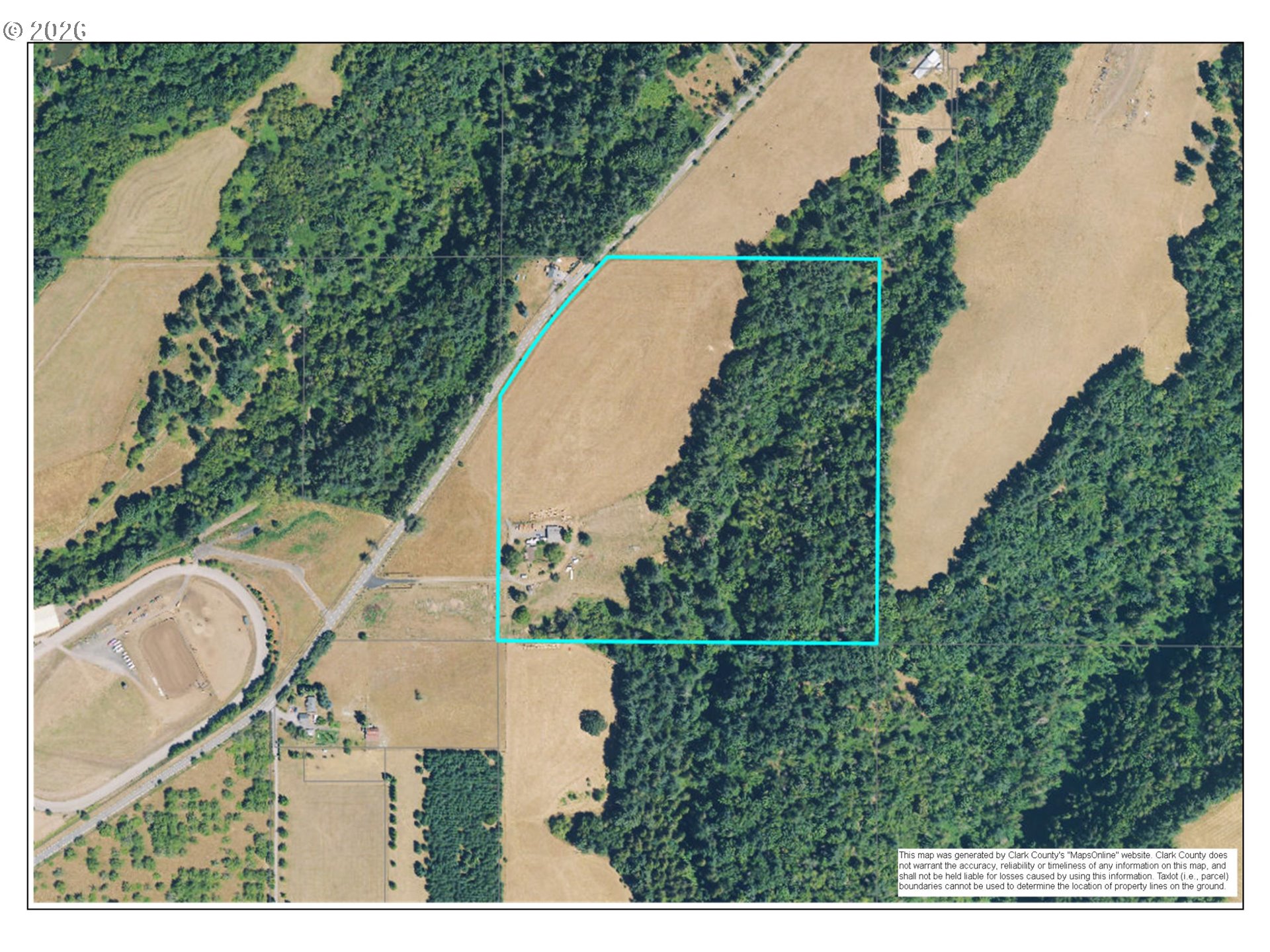 39143 Southeast Gibson Road Washougal, WA 98671 - Photo 5 of 26 a view of a swimming pool with a yard