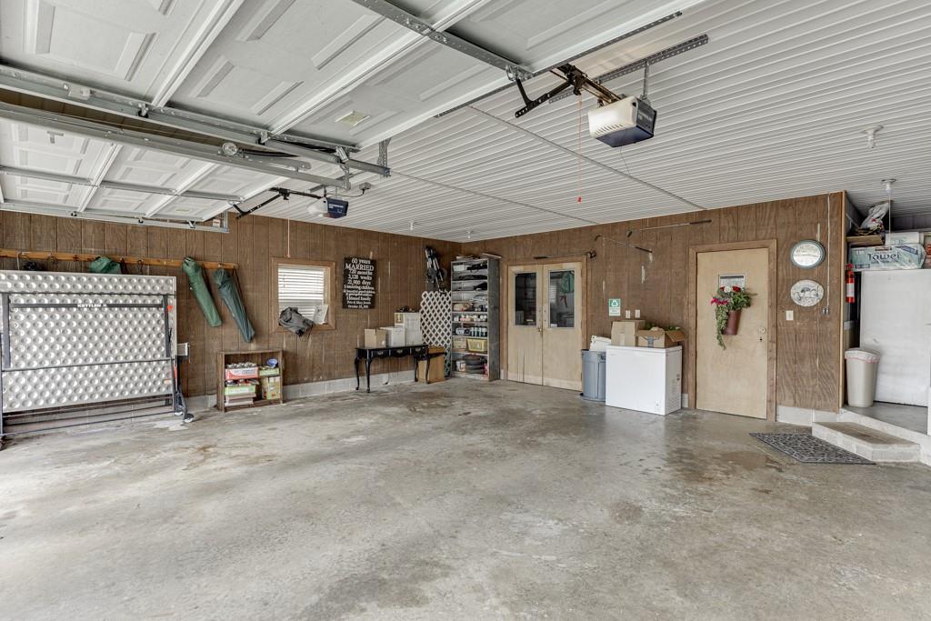 722 Charlie Morris Road Colbert, GA 30628 - Photo 54 of 78 a view of a livingroom with table and chair