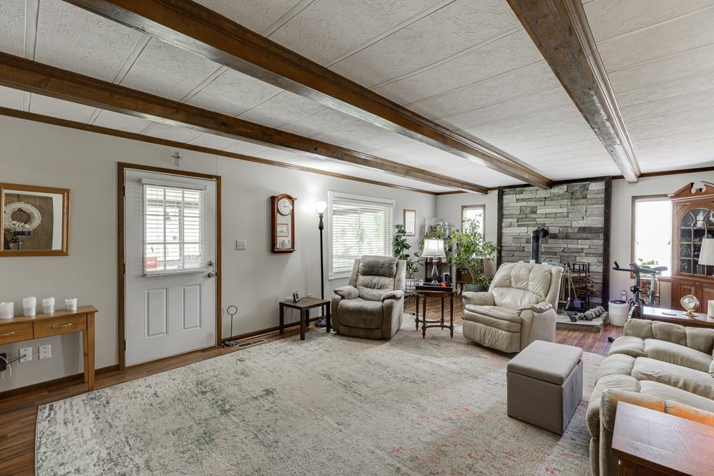 722 Charlie Morris Road Colbert, GA 30628 - Photo 10 of 78 a living room with furniture and wooden floor