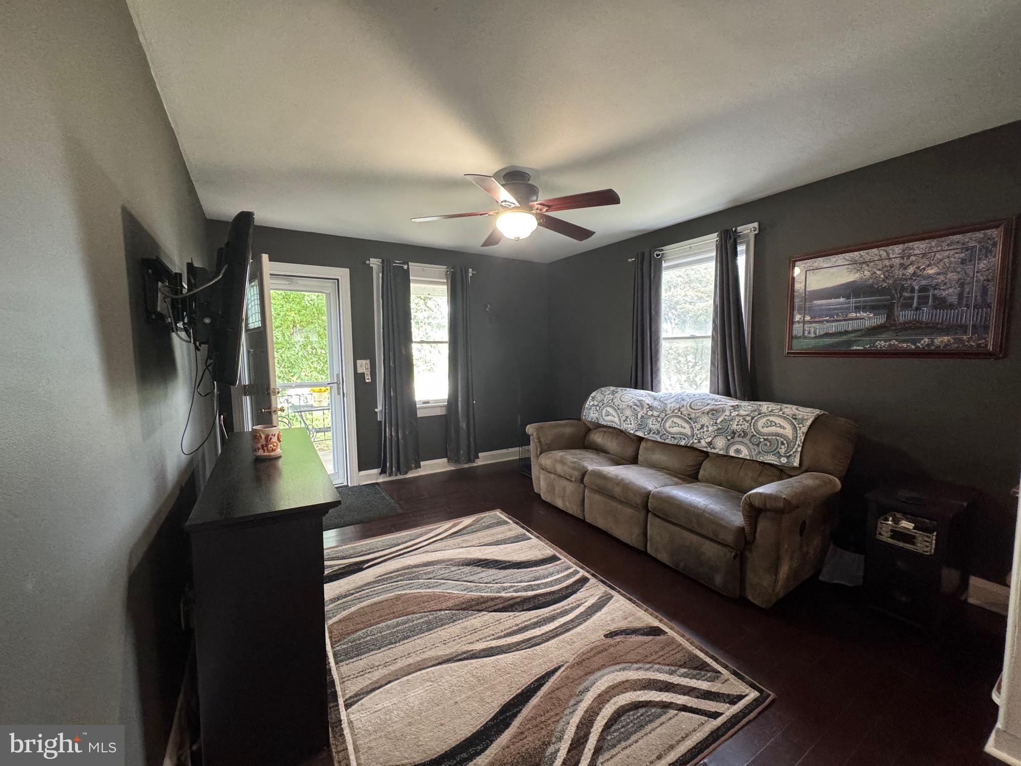 320 Harding Avenue Baltimore, MD 21220 - Photo 5 of 23 a living room with furniture and a chandelier