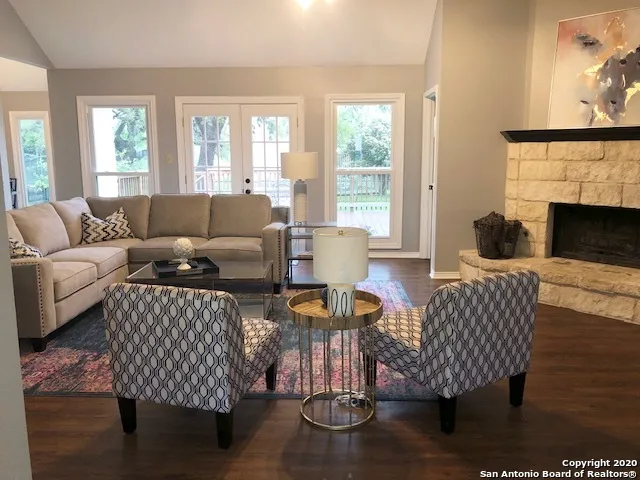 a living room with furniture or couch and a window