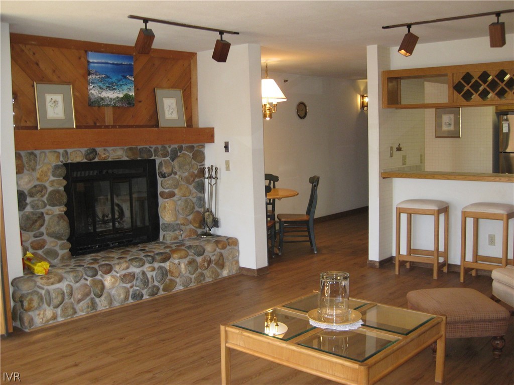 335 Ski Way, Unit 314 Incline Village, NV 89451 - Photo 1 of 15 a living room with furniture and a fireplace