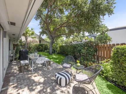a backyard of a house with lots of green space