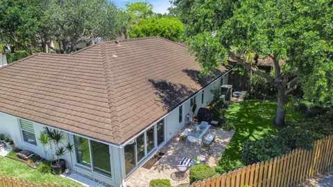 a view of a swimming pool with a deck
