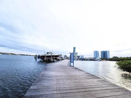 an aerial view of a city with lake view