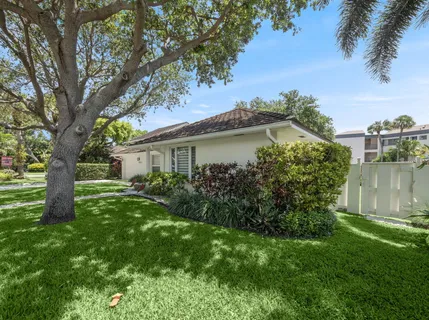 a view of a house with a garden
