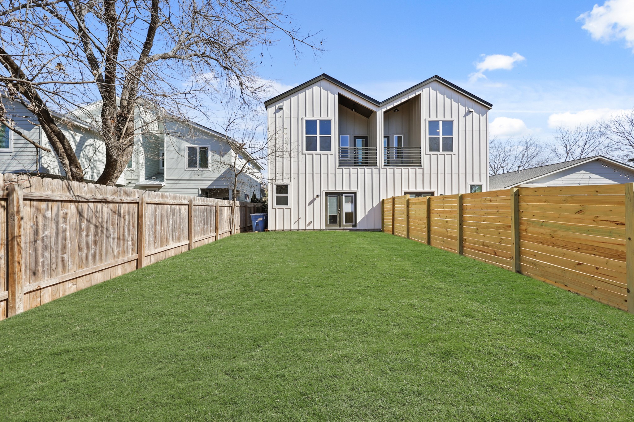 4801 Sara Drive, Unit A Austin, TX 78721 - Photo 20 of 40 a view of a house with backyard and fence