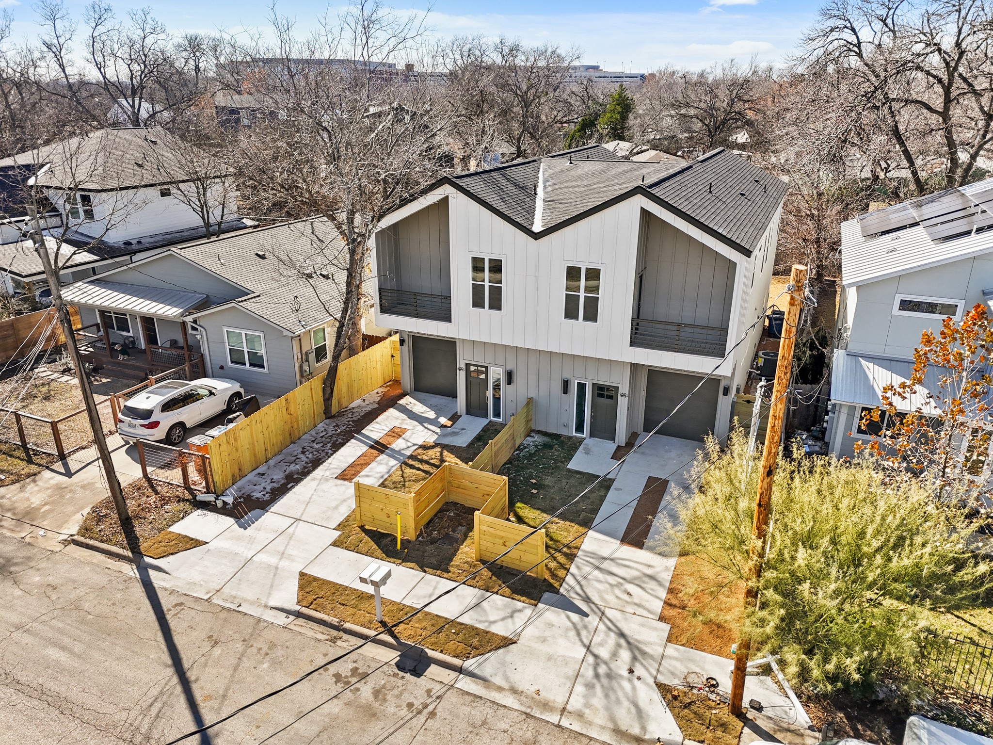 4801 Sara Drive, Unit A Austin, TX 78721 - Photo 38 of 40 a view of a patio with couches chairs and wooden floor