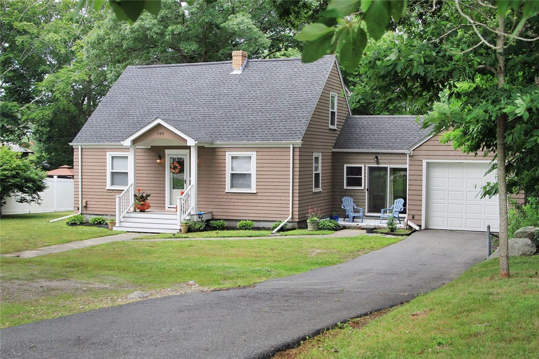 Charming cottage set next to protected land.  Large front and back yard.
