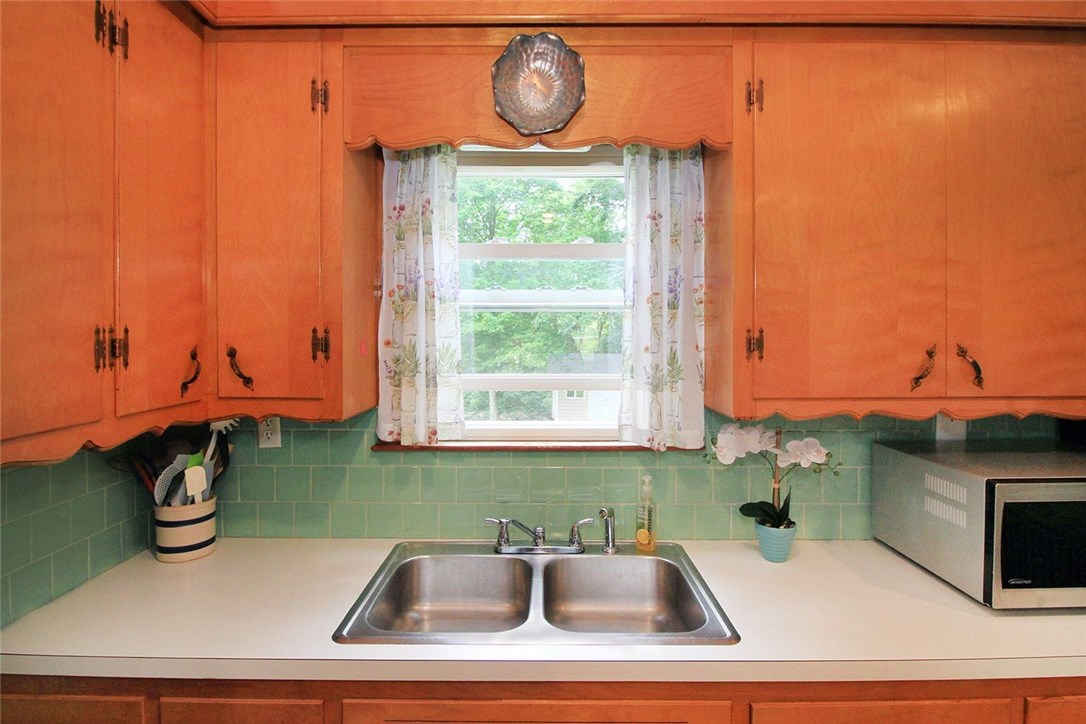 183 Fish Road Tiverton, RI 02878 - Photo 11 of 38 Great view of the backyard from the kitchen sink!
