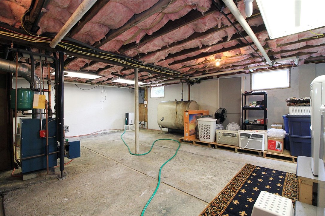 183 Fish Road Tiverton, RI 02878 - Photo 30 of 38 Nice clean basement with washer and dryer area.