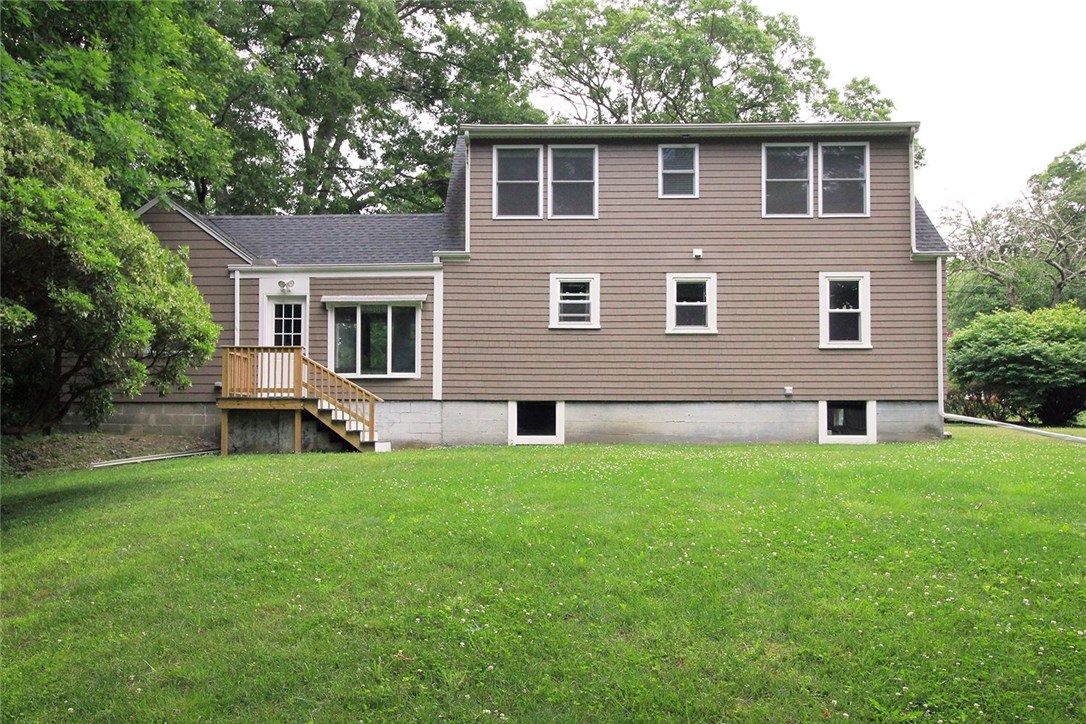 183 Fish Road Tiverton, RI 02878 - Photo 33 of 38 View of home from the large backyard.