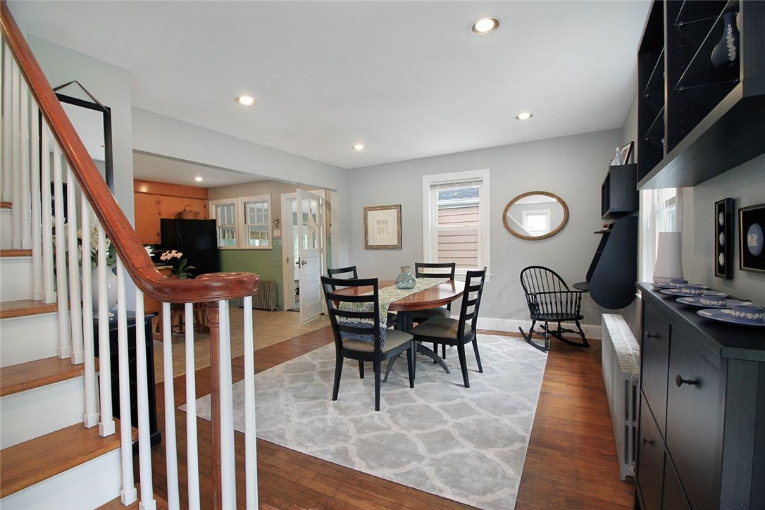 183 Fish Road Tiverton, RI 02878 - Photo 8 of 38 Looking into dining area which open to kitchen and sunroom/breezeway. Built-ins shown to right convey.