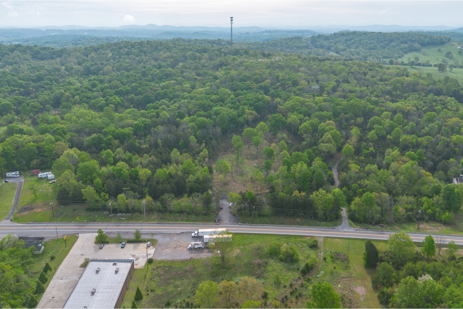 6205 Hunters Point Pike Lebanon, TN 37087 - Photo 7 of 45 a view of a city with lush green forest