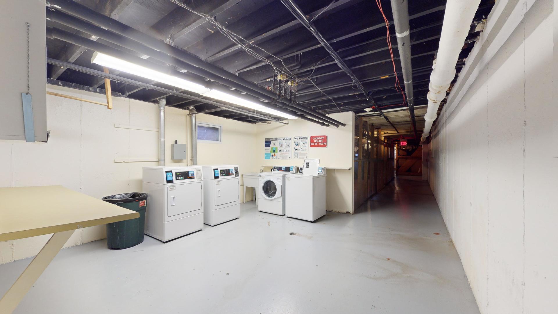 2302 West Algonquin Road, Unit 12 Rolling Meadows, IL 60008 - Photo 16 of 22 a utility room with dryer and washer